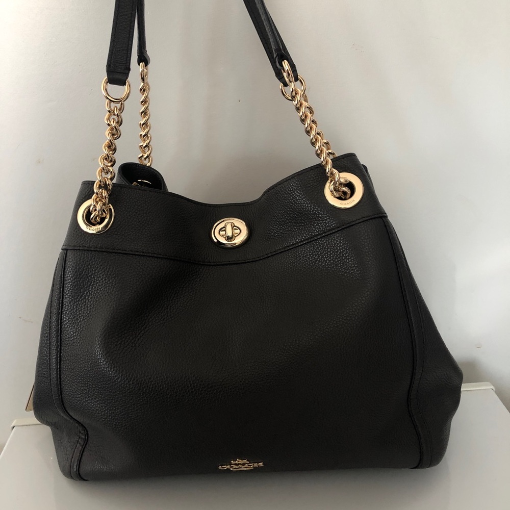Coach Edie Shoulder Chain bag with turn lock.